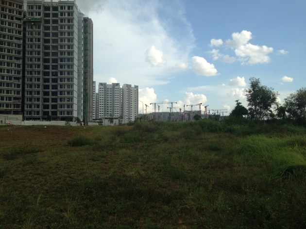 Grace's parents' apartment is on the 15th story, so we can see construction cranes like these dotting the horizon kilometers away.