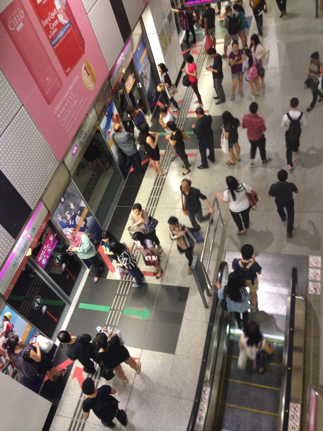 At every station, there are places to stand for those who want to board on either side of the doors, with the center reserved for those exiting the train. And people actually follow those, forming orderly queues on each side!